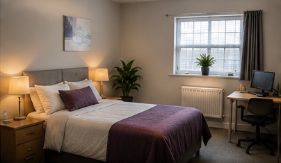 A clean, welcoming bedroom for independent living